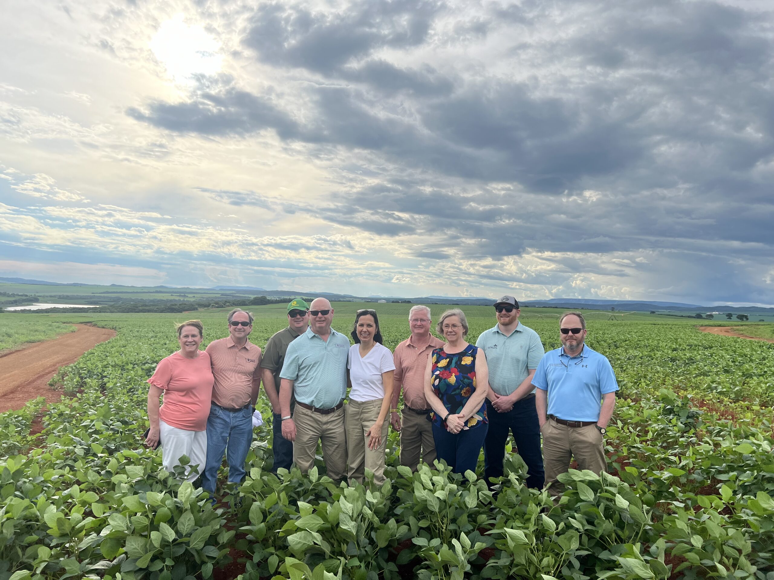 Missouri soybean farmers pose in Brazil field