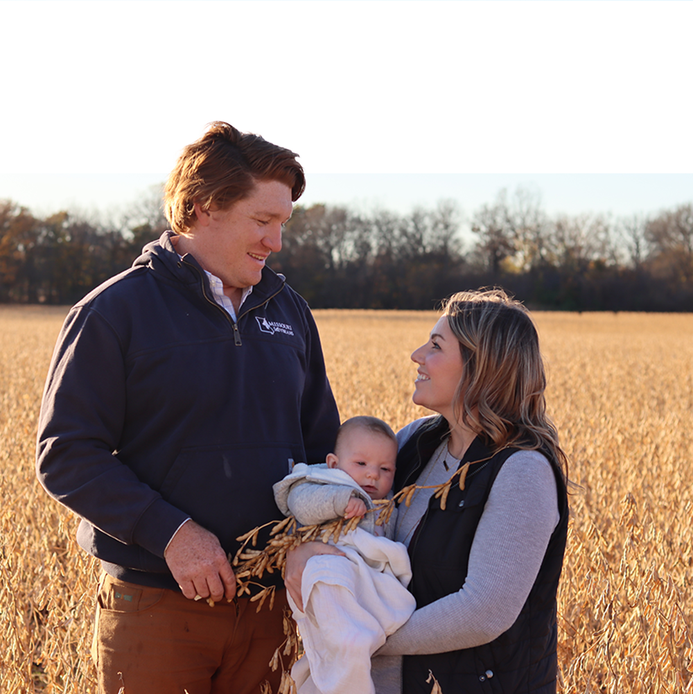MSA board member with family in soybean field